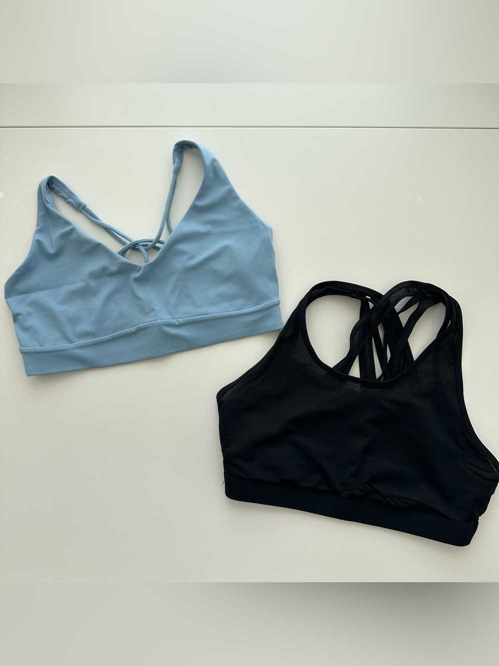 Athleta Blue and Fabletics Black sports bra lot- M